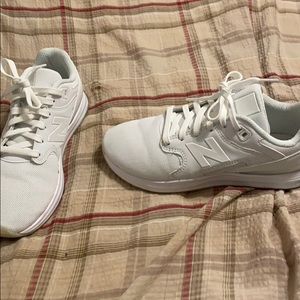 New balance white and a pair of grey ones